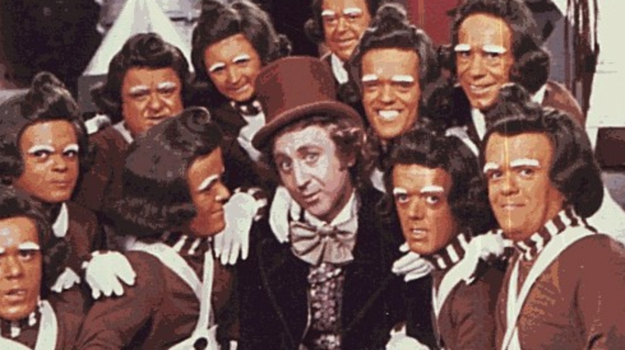 Actor Gene Wilder as Willy Wonka and the Oompa Loompas from the original Charlie and The Chocolate Factory.