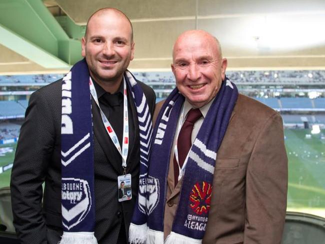 George and his dad at the soccer.