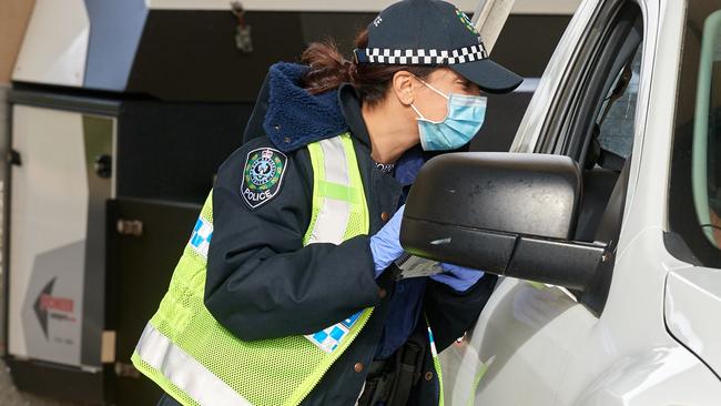 SA Police at a border checkpoint. Picture Frank Monger