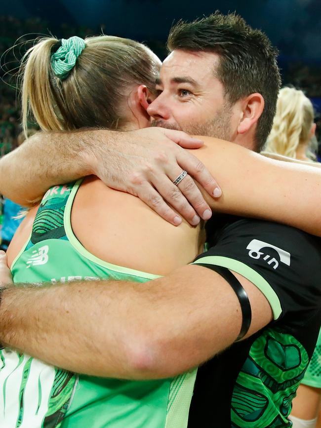 Dan Ryan and Alice Teague-Neeld embrace after West Coast Fever’s grand final win.