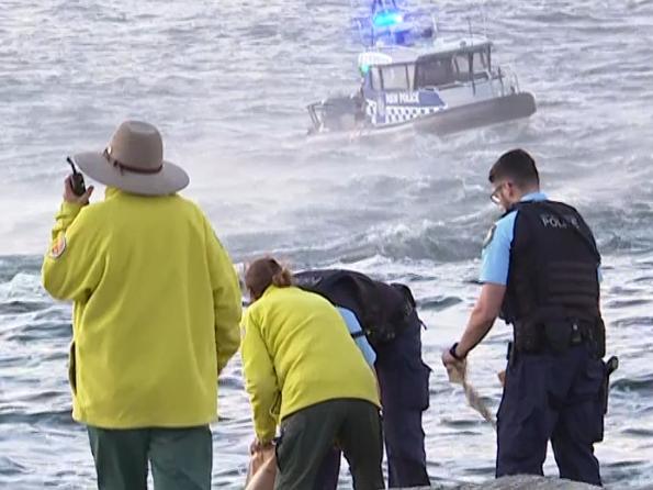 **WARNING FEE APPLIES - **MUST cREDIT TNV ** ONLINE USE ONLY, , TNV Footage at Kurnell this evening where two people are believe to have died after being swept off the rocks. Paramedics were scene doing CPR on one person aboard a police boat. Picture: TNV