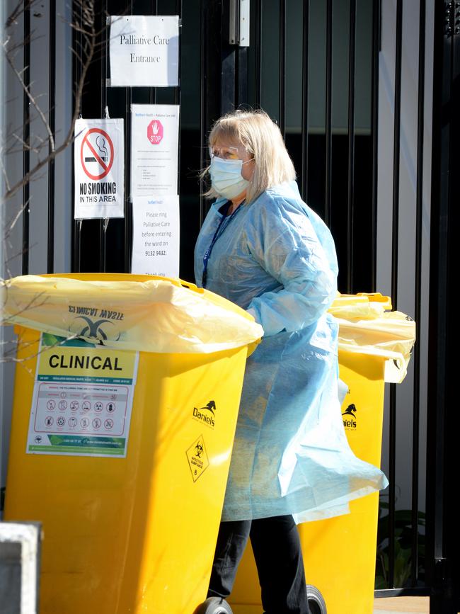 Clinical waste is removed from Epping Gardens Aged Care Home. Picture: Andrew Henshaw