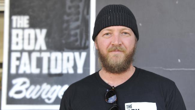 Dustin Bowie-Ford outside Woolgoolga's Box Factory Burgers. The shop is giving away free soft-serve ice cream throughout the lockdown with any phone order. Photo: Tim Jarrett