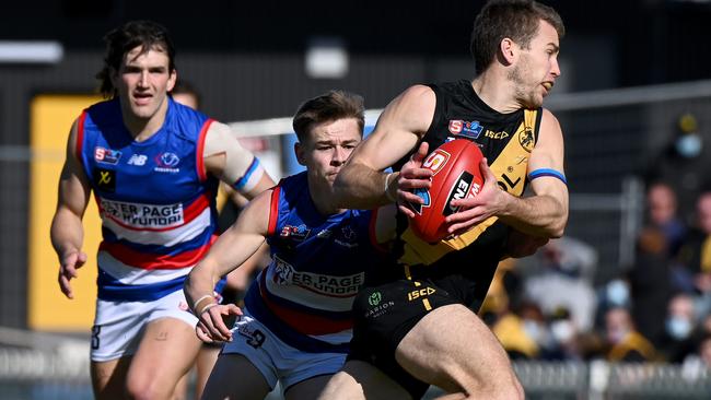 Glenelg’s Chris Curran breaks clear against Central District at the Bay Oval on Saturday. Picture: Naomi Jellicoe