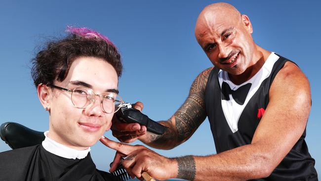 Joe Tongi pictured on Sunday cutting the hair of Ayden Frost as part of a pop-up Barber Shop at The Bleach Festival. Photograph: Jason O’Brien.