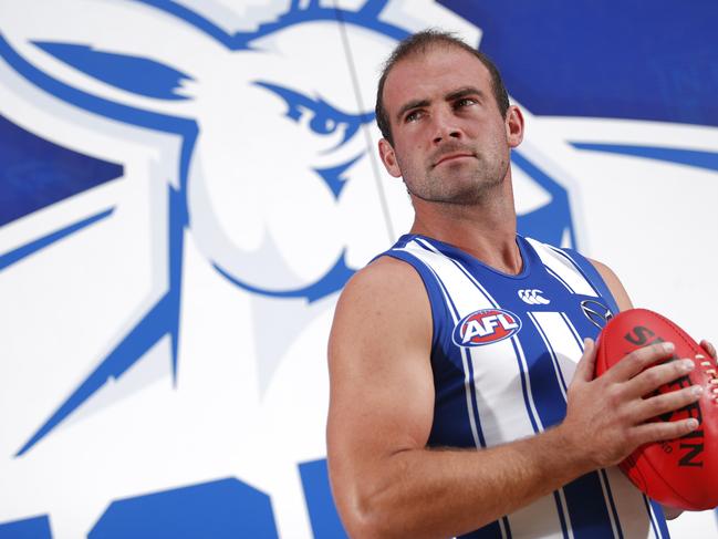 MELBOURNE, AUSTRALIA - FEBRUARY 08: Ben Cunnington of the Kangaroos poses for a photograph during the North Melbourne 2021 Official Team Photo Day at Arden Street Oval on February 08, 2021 in Melbourne, Australia. (Photo by Dylan Burns/AFL Photos via Getty Images)