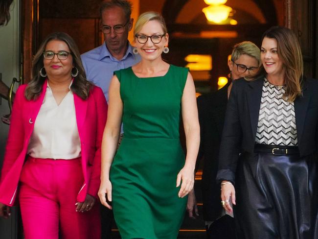 MELBOURNE AUSTRALIA - NewsWire Photos MAY 15, 2025: Mehreen Faruqi (left), newly elected Greens leader Larissa Waters (C) , and Senator Sarah Hanson-Young (R) walk out of their election meeting in Melbourne.Picture: NewsWire / Luis Enrique Ascui
