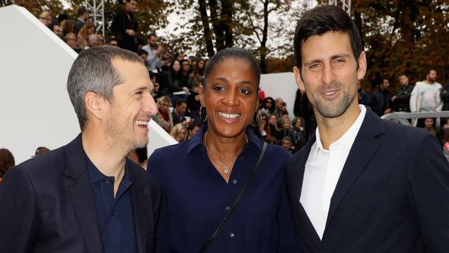 Marie-Jose Perec with actor Gillaume Canet and tennis star Novak Djokovic at a fashion festival in Paris.