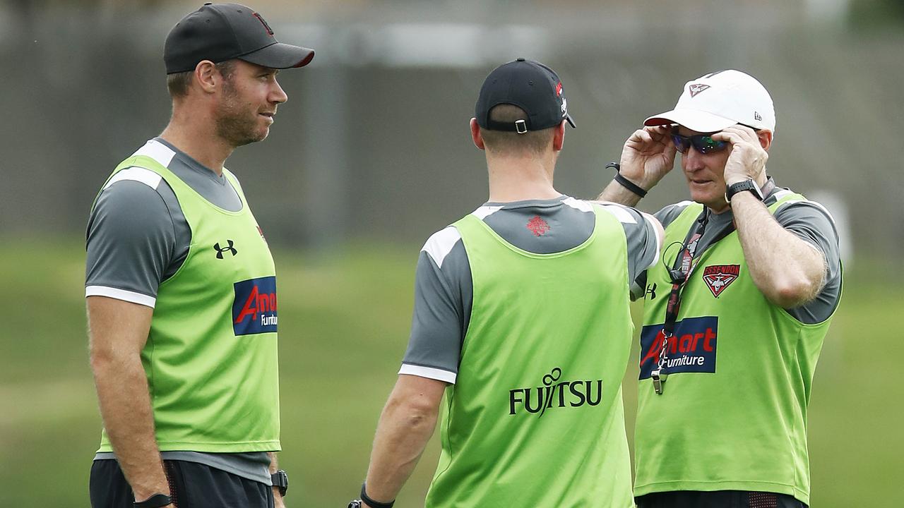 Essendon leaders, includgin Ben Rutten and John Worsfold talk tactics at training. Picture: Getty Images)