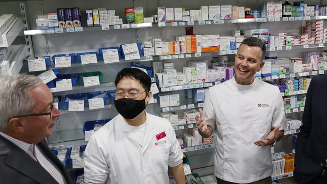 Pharmacists Joseph Kim and Trent Twomey at Priceline Pharmacy in the Sydney suburb of Beecroft. Picture: NCA NewsWire / Dylan Coker