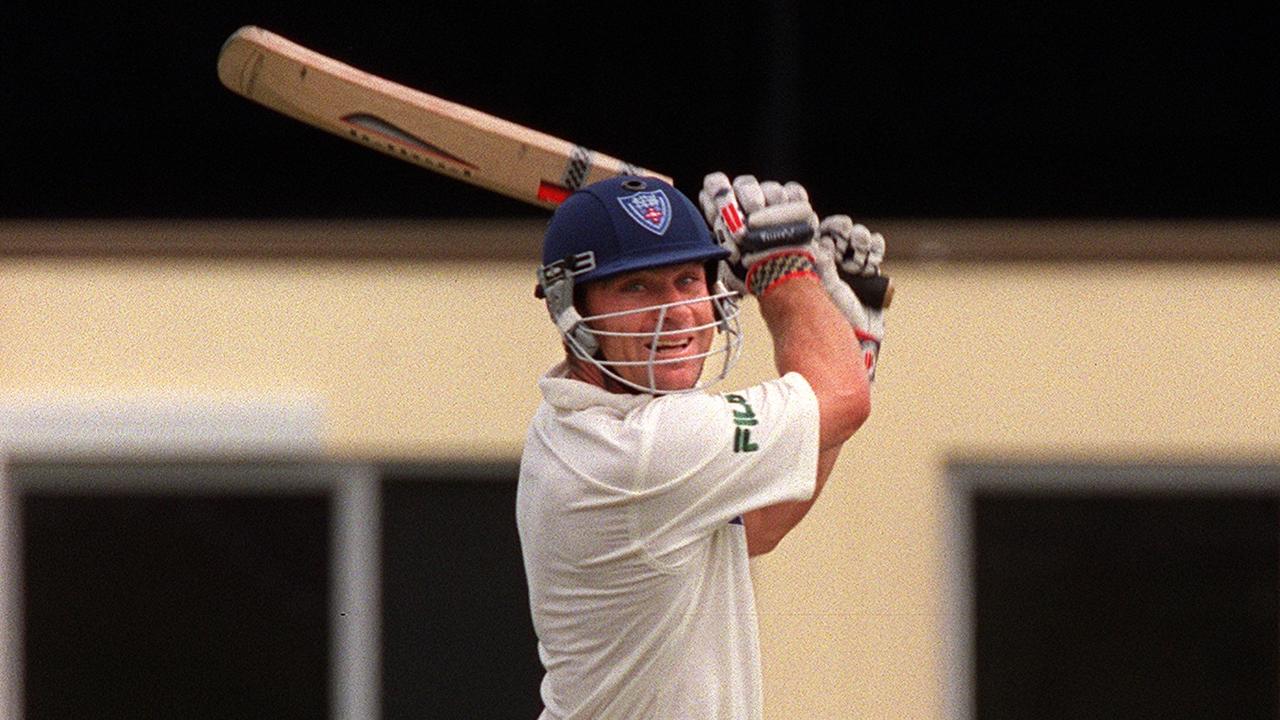 Michael Slater playing cricket for the NSW state team.