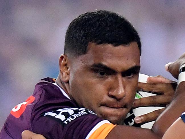 BRISBANE, AUSTRALIA - MARCH 22: Tevita Pangai Junior of the Broncos takes on the defence during the round two NRL match between the Brisbane Broncos and the North Queensland Cowboys at Suncorp Stadium on March 22, 2019 in Brisbane, Australia. (Photo by Bradley Kanaris/Getty Images)