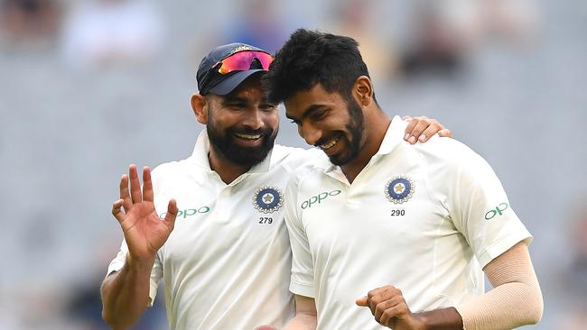 MELBOURNE, AUSTRALIA - DECEMBER 29: Mohammed Shami and Jasprit Bumrah of India chat during day four of the Third Test match in the series between Australia and India at Melbourne Cricket Ground on December 29, 2018 in Melbourne, Australia. (Photo by Quinn Rooney/Getty Images)