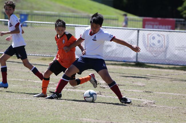The Premier Invitational football tournament on the Gold Coast. TSS v Brisbane Roar under-13s in action. Picture: Mike Batterham.