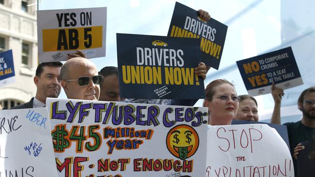 Uber and other rideshare company “partners” (we can’t stress enough that they are not employees even if we can’t exactly explain how they’re not) are also looking for a better deal. (AP Photo/Rich Pedroncelli)