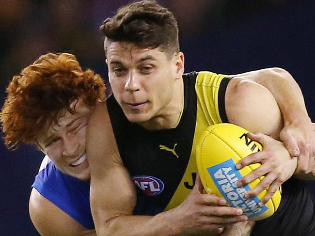 AFL Round 7. 04/05/2019. Western Bulldogs v Richmond at Marvel Stadium.   Richmonds Dion Prestia  tackled by Bulldog Ed Richards  2nd quarter    . Pic: Michael Klein.