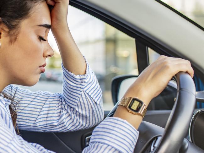 Stressed woman drive car feeling sad and angry. Girl tired, fatigue mental on car. Sleepy and drunk female hangover. Illegal law driver license. Driving when tired and do not drive drowsy concept