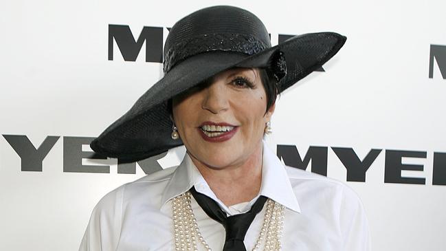 Singer Liza Minnelli was carried up stairs by her bodyguards at Derby Day 2009.