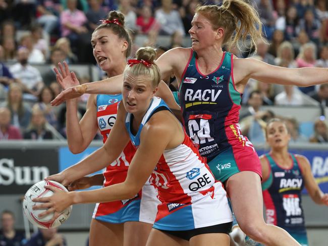 Maddy Turner in a fierce tussle with the Vixens attack in round two.