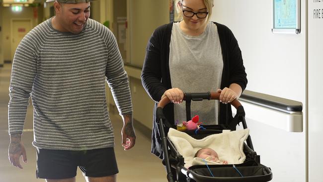 Newborn girl Rylee Gardner, pictured with dad Logan Gardner and mum Aime Rootsey is being transported to Brisbane for treatment after suffering seizures. PICTURE: MATT TAYLOR.