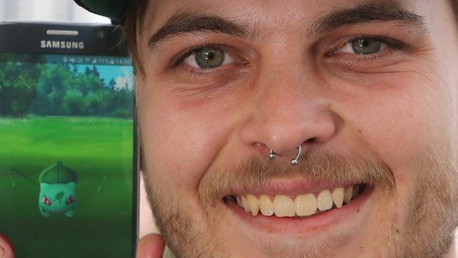 Player James Schukin of Upper Coomera with a “Bulbasaur”. Picture Glenn Hampson