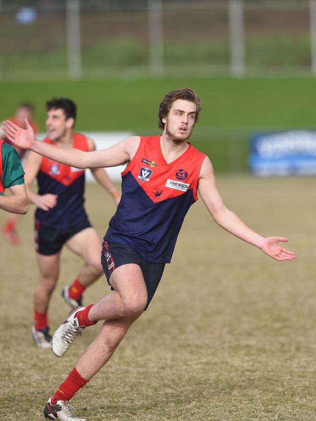 Mt Eliza’s Jordan Capkin celebrates a goal against Pines. Picture: Chris Eastman