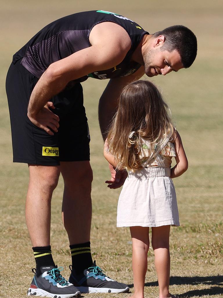 Cotchin and his daughter during Tigers training at the AFL’s Gold Coast pandemic hub during the 2020 season. Picture: Michael Klein