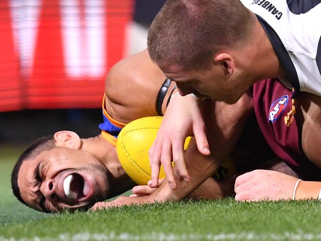 Charlie Cameron of the Lions reacts after taking a mark during the Second Semi Final match between the Brisbane Lions and the Greater Western Sydney Giants during week 2 of the AFL Finals Series at the Gabba in Brisbane, Saturday, September 14, 2019. (AAP Image/Darren England) NO ARCHIVING, EDITORIAL USE ONLY