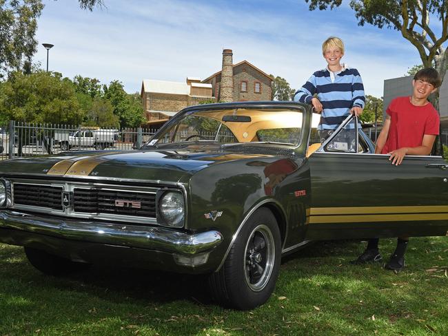 11/12/20 - Max Barnett, 13, and Jack Petersen, 13, with a HT 1970 Monaro ahead of the most amazing collection of Holdens ever assembled will be at the National Motor Museum from Saturday. Picture: Tom Huntley