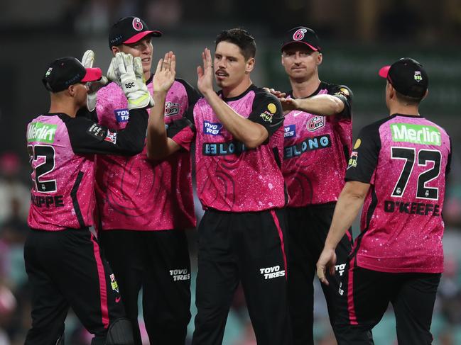 SYDNEY, AUSTRALIA - DECEMBER 08: Ben Dwarshuis of the Sixers celebrates after taking the wicket of Tom Rogers of the Renegades during the BBL match between Sydney Sixers and Melbourne Renegades at Sydney Cricket Ground on December 08, 2023 in Sydney, Australia. (Photo by Jason McCawley - CA/Cricket Australia via Getty Images)