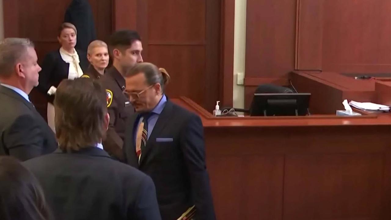 Depp approached the stand as the court went to recess. Reuters