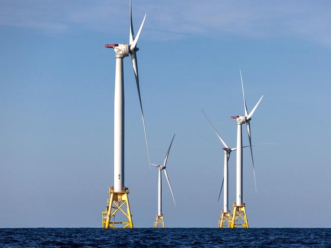 (FILES) Wind turbines generate electricity at the Block Island Wind Farm on July 7, 2022 near Block Island, Rhode Island. They're âuglyâ, âruin the landscapeâ and âkill whalesâ: Donald Trump accuses wind turbines of all sorts of evils and plunged their industry into turmoil as soon as he returned to the White House. âWe're not going to do the windmill thing,â the American president launched on January 20, the day of his inauguration, before digressing on the subject. âThey kill birds and ruin beautiful landscapesâ, âthey're all made in Chinaâ and âif you like whales, you don't want wind turbines eitherâ, said the Republican, before signing a series of executive orders at the end of the day to put a spanner in the industry's works. (Photo by JOHN MOORE / GETTY IMAGES NORTH AMERICA / AFP)