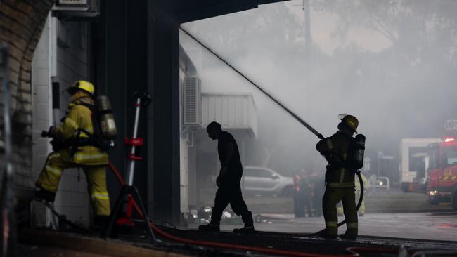 Beloved Territory business the NT Oriental Emporium was ravaged by fire this morning. Investigators are now on the scene. Picture: Che Chorley