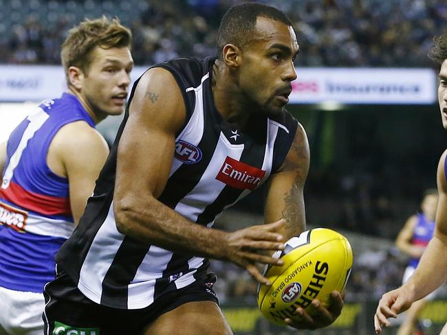 AFL Round 13 Collingwood v Western Bulldogs at Etihad Stadium. Heritier Lumumba clears off half back  . Pic: Michael Klein. Sunday June 15, 2014.