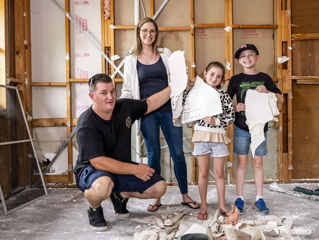 Bianca and Steve, Cooper, 10, and Qaley, 1, gutted their home in the wake of the floods. Picture: Darren Leigh Roberts