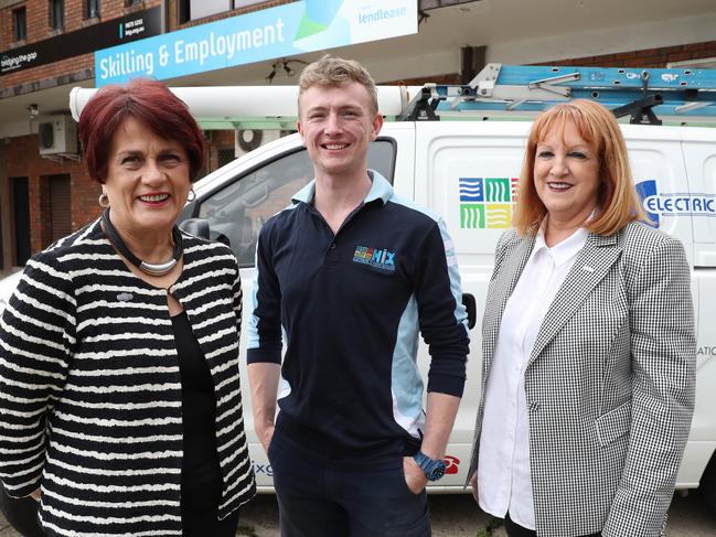 Judith Field (Community Partnerships Manager with Lendlease), Fourth Year Apprentice Jono Owen, 22 and Lea Hix (General Manager of Hix Group) pose for a photo at St Mary's Skills and Employment Centre. Leandlease has developed the employment hub in St Mary's to help residents find work. (AAP Image/David Swift)