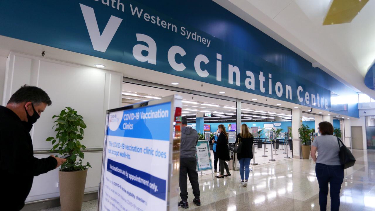 Sydneysiders arrive at the newly opened South Western Sydney Vaccination Centre at Macquarie Fields during lockdown on Monday. Photo: Lisa Maree Williams/Getty Images
