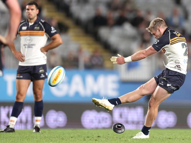 Brumbies’ Ryan Lonergan kicks a penalty to win the match. Picture: Getty Images