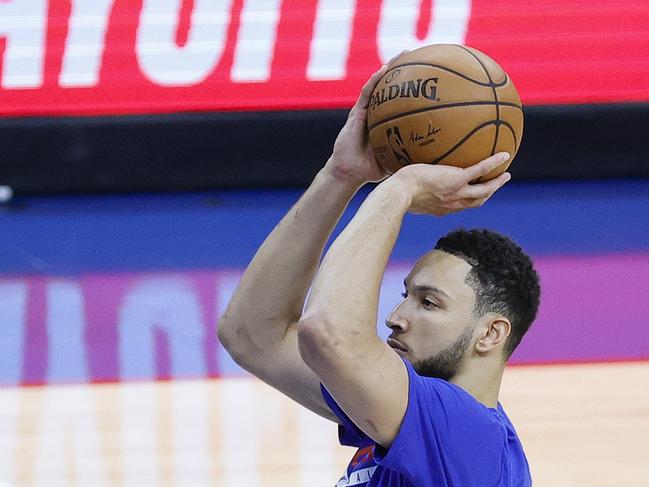 Simmons was intent on warming up his free throws before Game 5.