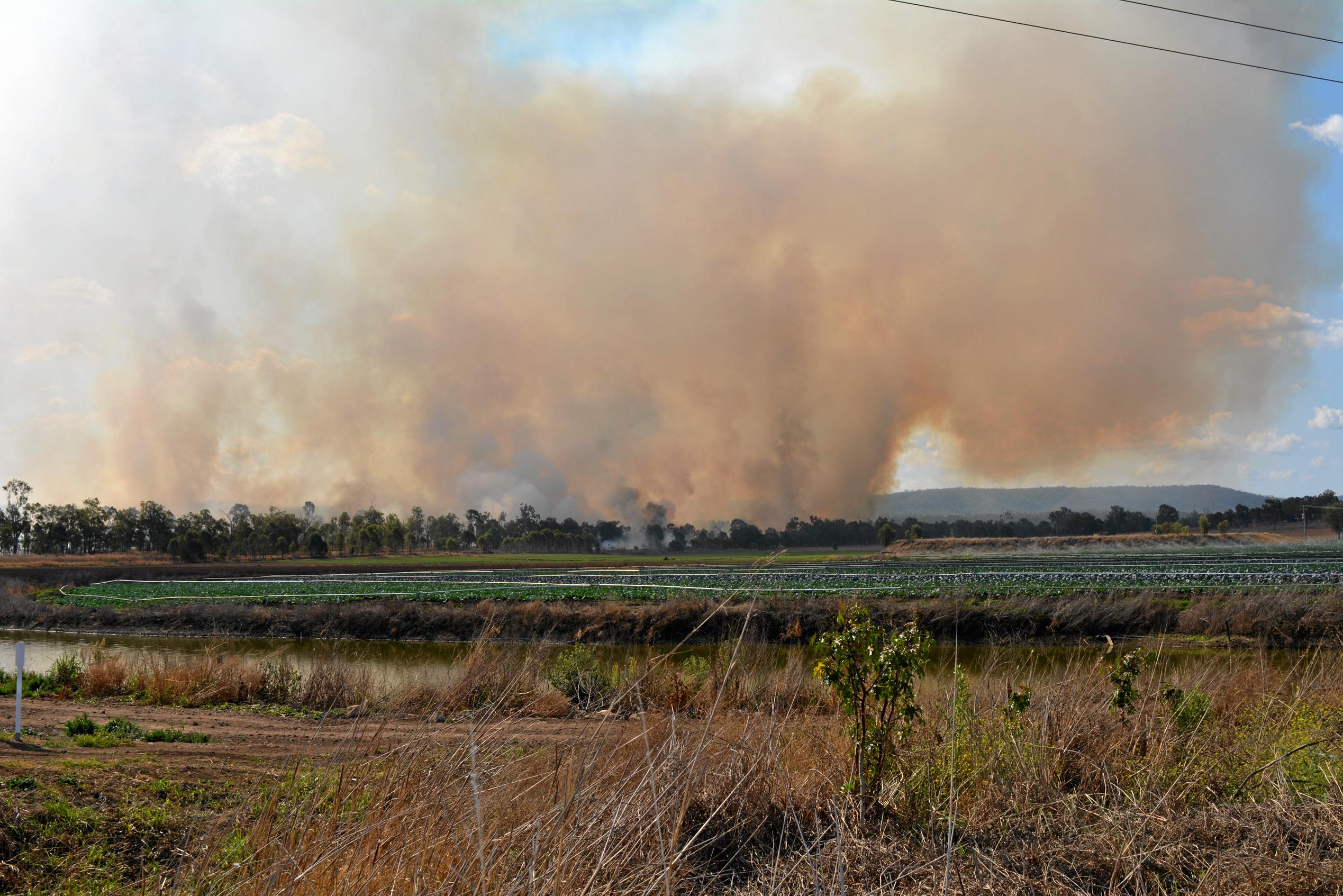 Crews are battling a grass fire which started at Philps road, Grantham. September 13, 2018. Picture: MEG BOLTON