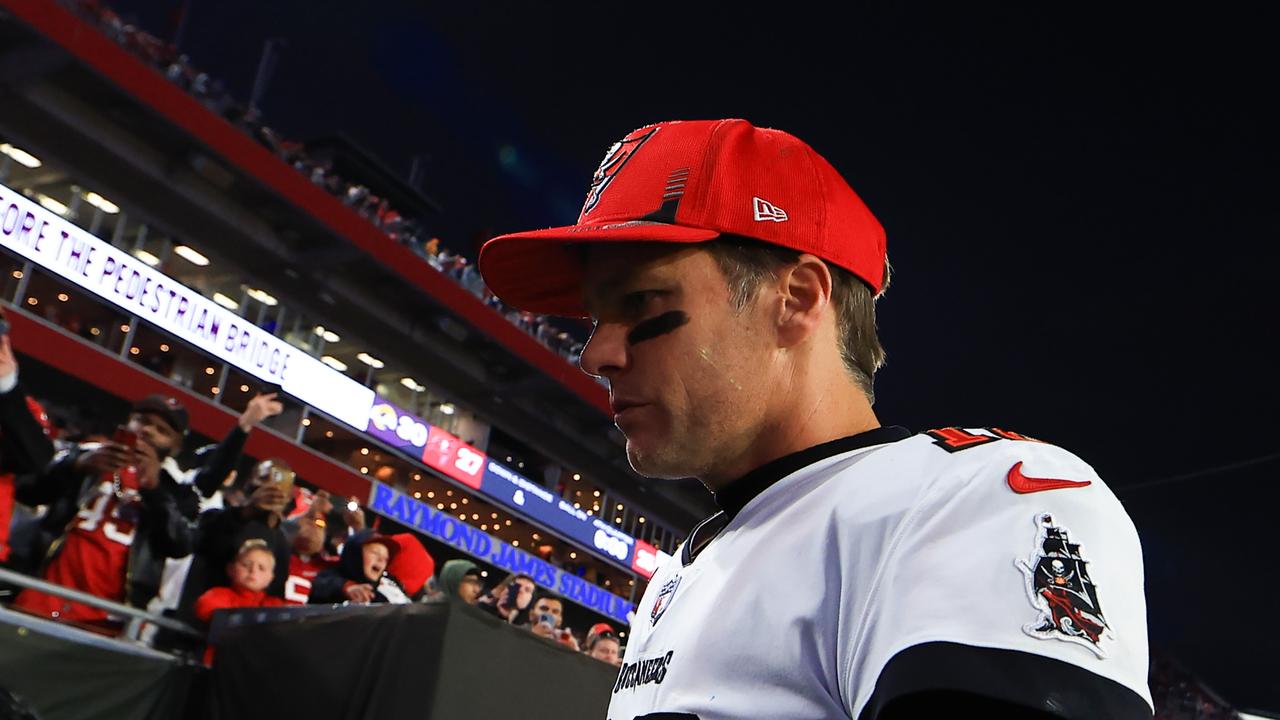TAMPA, FLORIDA - JANUARY 23: Tom Brady #12 of the Tampa Bay Buccaneers reacts after being defeated by the Los Angeles Rams 30-27 in the NFC Divisional Playoff game at Raymond James Stadium on January 23, 2022 in Tampa, Florida. (Photo by Mike Ehrmann/Getty Images)