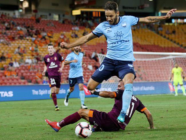 BRISBANE, AUSTRALIA - MARCH 29: Milos Ninkovic of Sydney FC kicks the ball during the round 23 A-League match between the Brisbane Roar and Sydney FC at Suncorp Stadium on March 29, 2019 in Brisbane, Australia. (Photo by Chris Hyde/Getty Images)