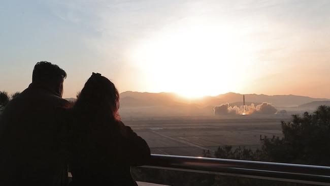 Kim Jong-un watches the launch of a Hwasong-17 intercontinental ballistic missile during the drills. Picture: AFP