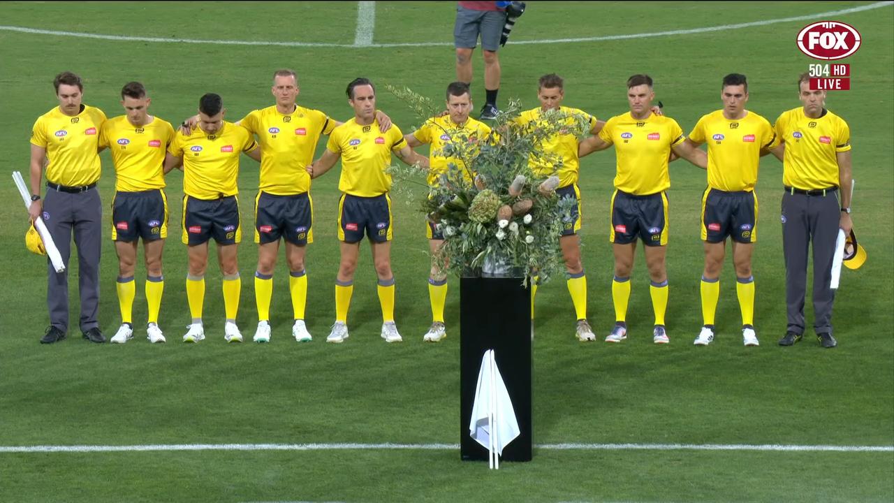 Thursday night’s umpires come together for a tribute to Jesse and Luke. Photo: Fox Sports