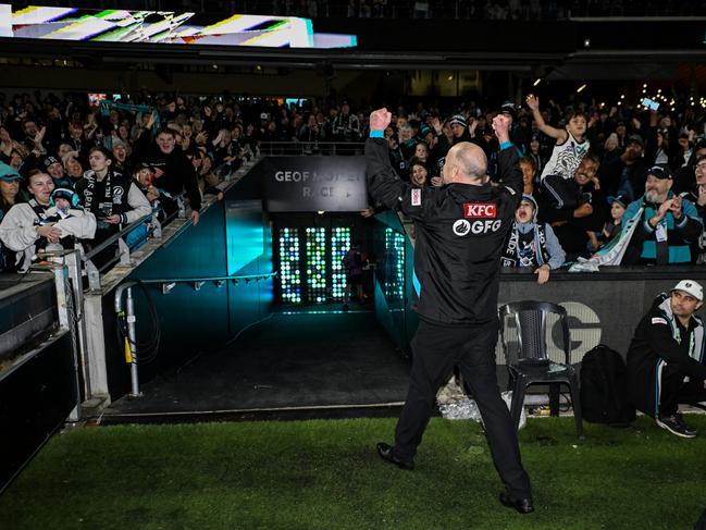 Ken Hinkley celebrates the win with the crowd. Picture: Mark Brake/Getty Images.