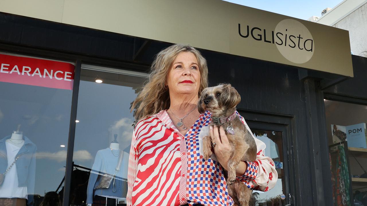 Jacinta Matlock, pictured with dog Pippa, is closing her Uglisista store in Pakington St. Picture: Alison Wynd.