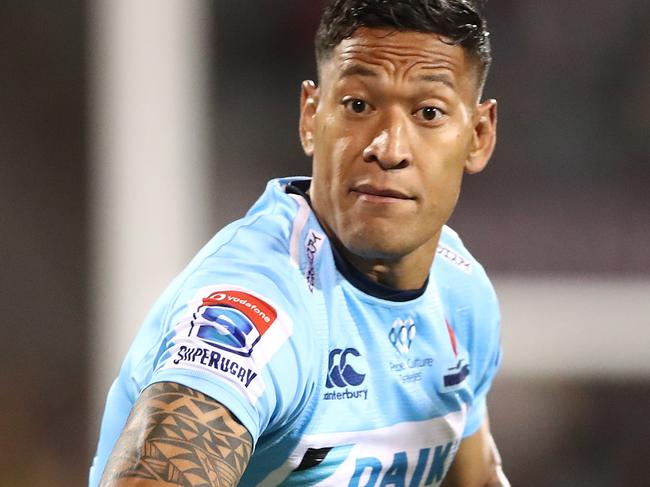 CANBERRA, AUSTRALIA - MARCH 15: Israel Folau of the Waratahs offloads during the round five Super Rugby match between the Brumbies and the Waratahs at GIO Stadium on March 15, 2019 in Canberra, Australia. (Photo by Mark Metcalfe/Getty Images)