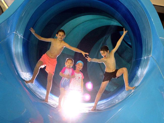 Kids check out the AquaPulse water slide. Did we mention it’s the biggest in the state? Picture: Adam Elwood