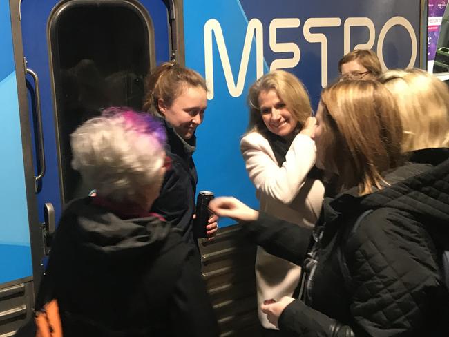 Scores of passengers hugged the train driver after her emotional announcement.