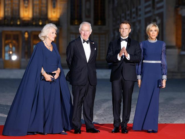 Queen Camilla, King Charles, French President Emmanuel Macron and Brigitte Macron arrive to attend a state banquet at the Palace of Versailles. Picture: AFP